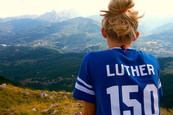 Luther student gazing at vista while studying abroad.